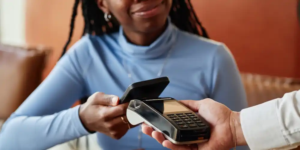 woman using nfc for payment