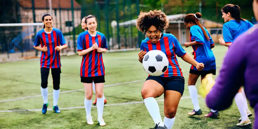 woman playing football